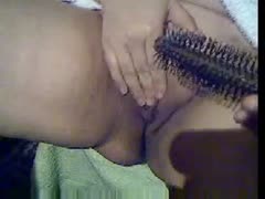 Plumpy white women of mine pets her constricted pussy with spiky hair brush